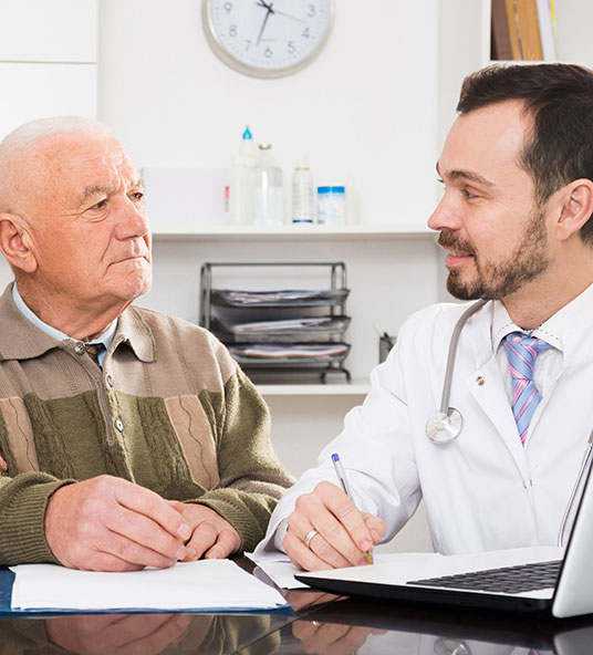 A man talking to a doctor